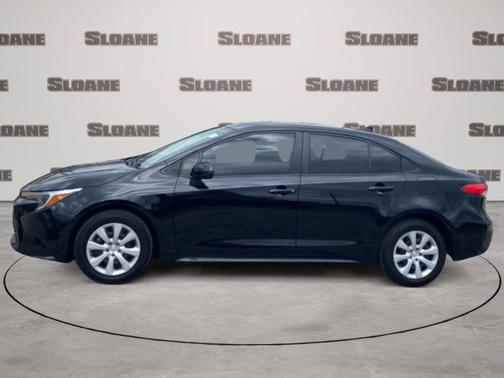Midnight Black Metallic 2025 Toyota Corolla Hybrid LE