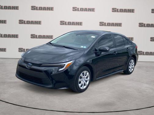 Midnight Black Metallic 2025 Toyota Corolla Hybrid LE