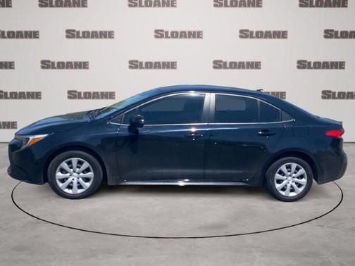 Midnight Black Metallic 2025 Toyota Corolla Hybrid LE