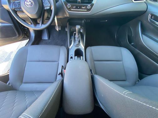 Midnight Black Metallic 2025 Toyota Corolla Hybrid LE
