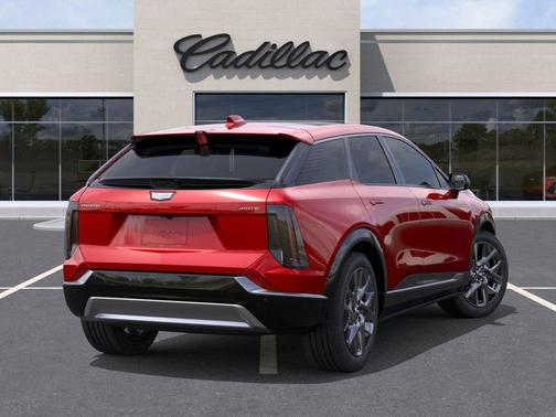 Radiant Red Tintcoat 2026 Cadillac OPTIQ Premium Luxury