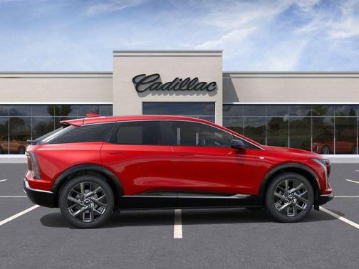 Radiant Red Tintcoat 2026 Cadillac OPTIQ Premium Luxury