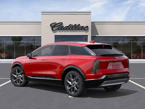 Radiant Red Tintcoat 2026 Cadillac OPTIQ Premium Luxury