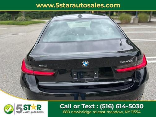 BLACK 2024 BMW 330 xDrive