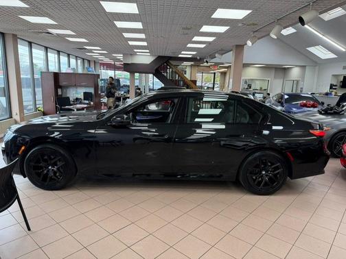Black 2024 BMW 740 i xDrive