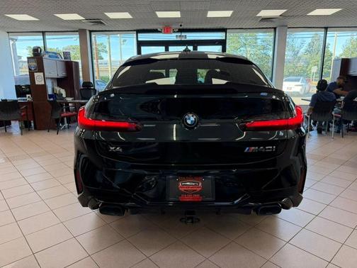 Black Sapphire Metallic 2024 BMW X4 M40i Sports Activity Coupe
