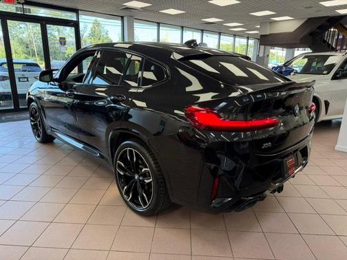 Black Sapphire Metallic 2024 BMW X4 M40i Sports Activity Coupe