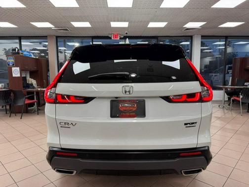 White 2025 Honda CR-V Hybrid Sport Touring AWD