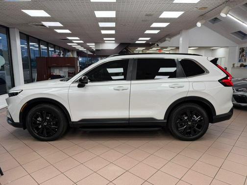 White 2025 Honda CR-V Hybrid Sport Touring AWD