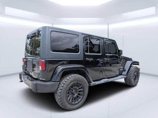 Black Clearcoat 2016 Jeep Wrangler Unlimited Sahara
