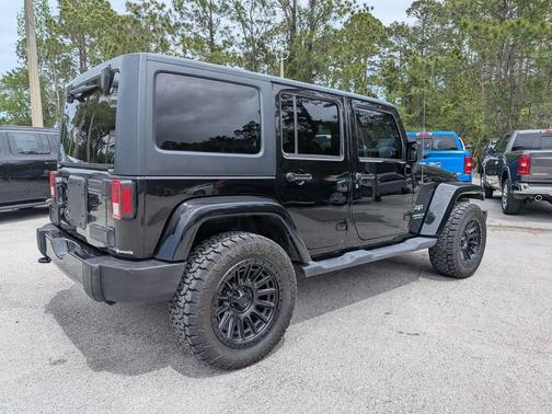 Black Clearcoat 2016 Jeep Wrangler Unlimited Sahara