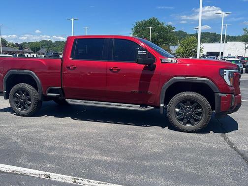 Volcanic Red Tintcoat 2024 GMC Sierra 3500 AT4