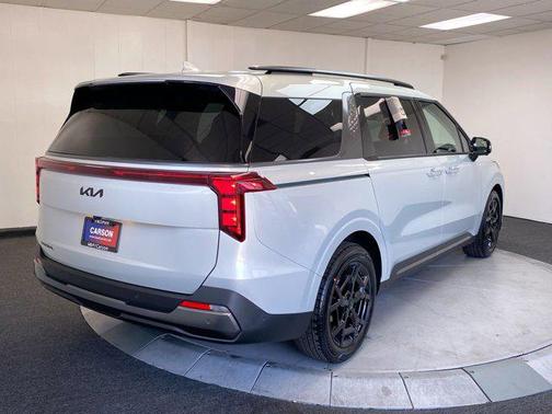 Ivory Silver 2026 Kia Carnival SX