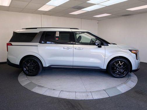 Ivory Silver 2026 Kia Carnival SX