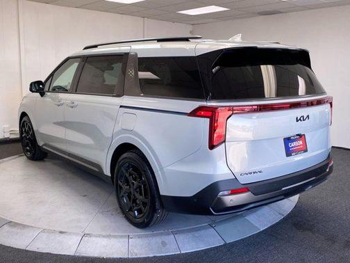 Ivory Silver 2026 Kia Carnival SX