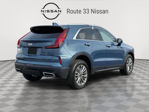 Deep Sea Metallic 2024 Cadillac XT4 Premium Luxury