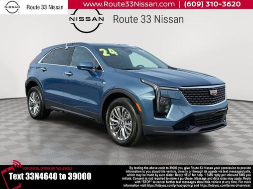 Deep Sea Metallic 2024 Cadillac XT4 Premium Luxury