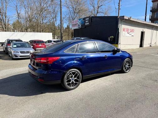 Ruby Red Metallic Tinted Clearcoat 2017 Ford Focus SEL