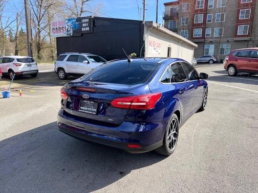 Ruby Red Metallic Tinted Clearcoat 2017 Ford Focus SEL
