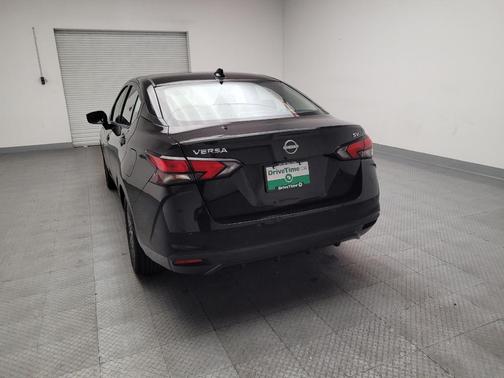 Super Black 2024 Nissan Versa 1.6 SV