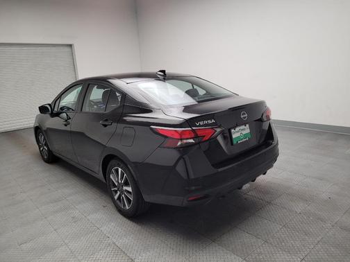 Super Black 2024 Nissan Versa 1.6 SV