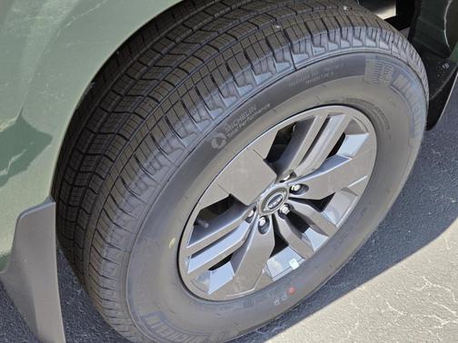 Green 2026 Nissan Frontier SV