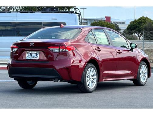 Ruby Flare Pearl 2026 Toyota Corolla Hybrid LE