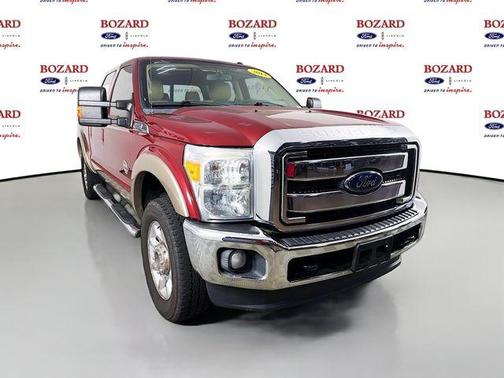 Red 2014 Ford F-250 Lariat