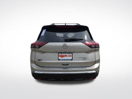 Champagne Silver Metallic/Super Black 2026 Nissan Rogue Platinum