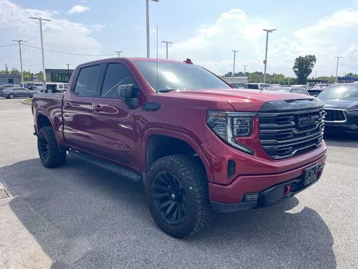 Volcanic Red 2025 GMC Sierra 1500 AT4