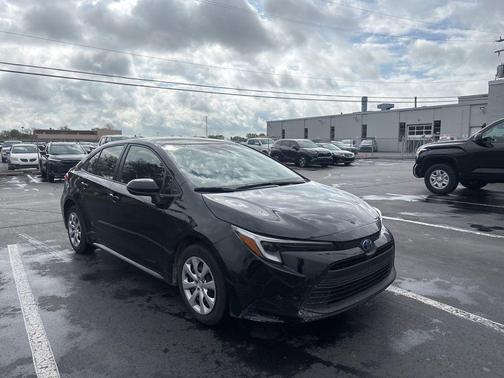Midnight Black Metallic 2025 Toyota Corolla Hybrid LE