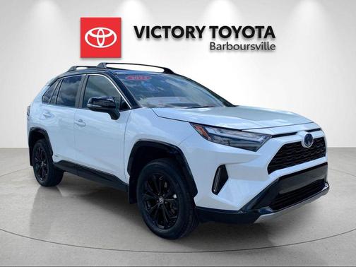 Wind Chill Pearl/Midnight Black Metallic 2024 Toyota RAV4 Hybrid SE