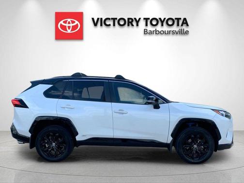 Wind Chill Pearl/Midnight Black Metallic 2024 Toyota RAV4 Hybrid SE
