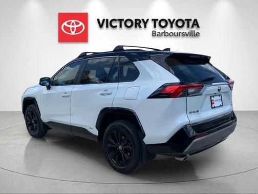 Wind Chill Pearl/Midnight Black Metallic 2024 Toyota RAV4 Hybrid SE