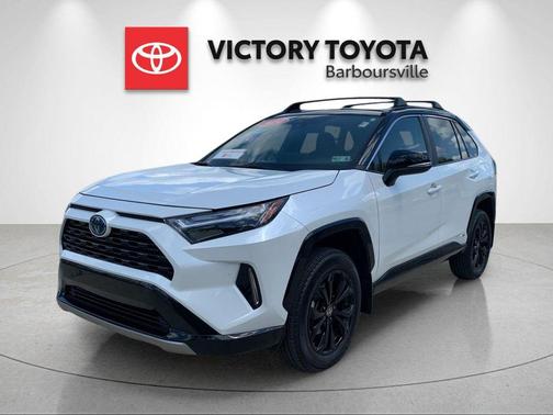 Wind Chill Pearl/Midnight Black Metallic 2024 Toyota RAV4 Hybrid SE