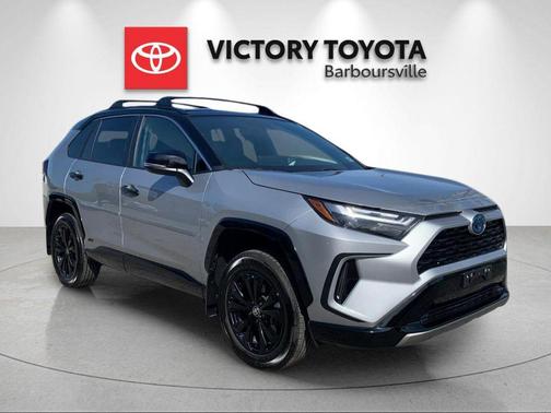 Silver Sky Metallic/Midnight Black Metallic 2024 Toyota RAV4 Hybrid SE