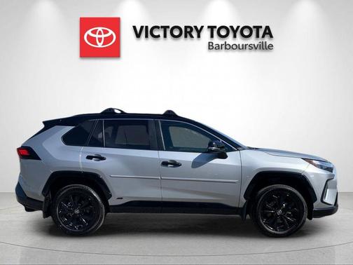 Silver Sky Metallic/Midnight Black Metallic 2024 Toyota RAV4 Hybrid SE