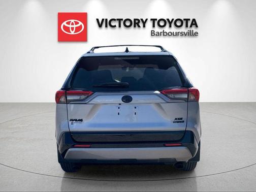 Silver Sky Metallic/Midnight Black Metallic 2024 Toyota RAV4 Hybrid SE