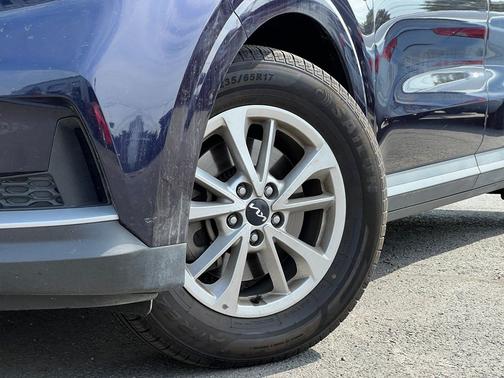 Blue 2024 Kia Carnival LX