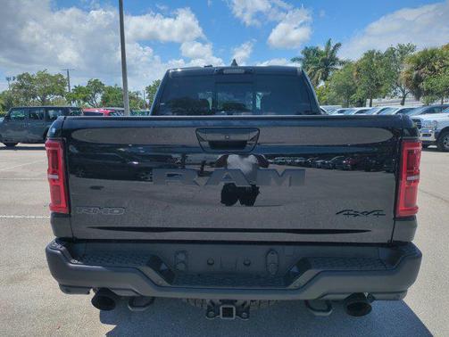 Diamond Black Crystal Pearlcoat 2026 RAM 1500 RHO Crew Cab 4x4 5'7' Box