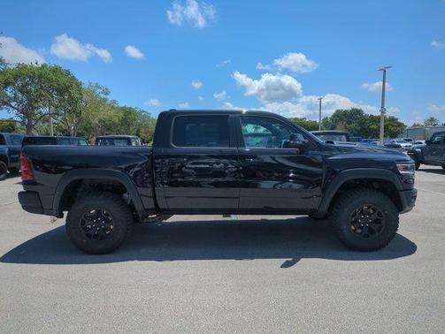 Diamond Black Crystal Pearlcoat 2026 RAM 1500 RHO Crew Cab 4x4 5'7' Box