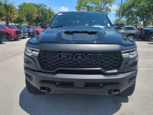 Diamond Black Crystal Pearlcoat 2026 RAM 1500 RHO Crew Cab 4x4 5'7' Box