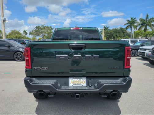 Serrano Green Metallic 2026 RAM 1500 RHO Crew Cab 4x4 5'7' Box