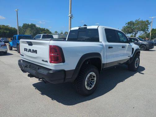 Bright White Clearcoat 2026 RAM 1500 RHO Crew Cab 4x4 5'7' Box