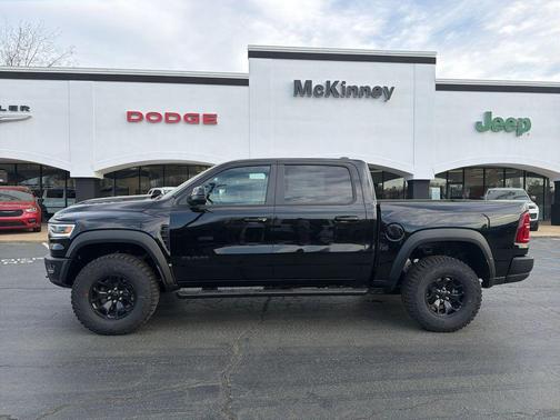 Diamond Black Crystal Pearlcoat 2026 RAM 1500 RHO Crew Cab 4x4 5'7' Box