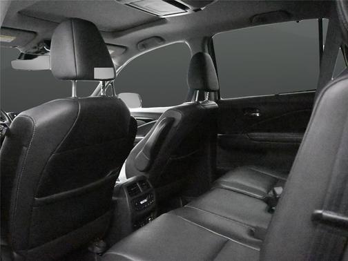 Deep Sea Metallic 2024 Cadillac XT4 Sport