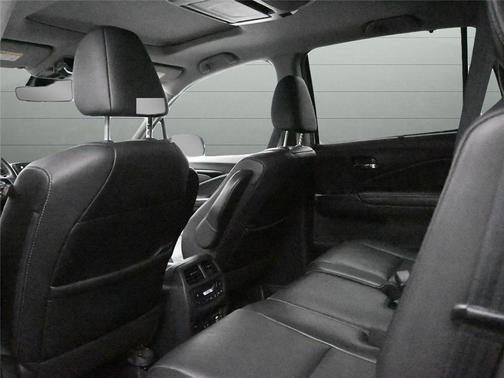 Deep Sea Metallic 2024 Cadillac XT4 Sport