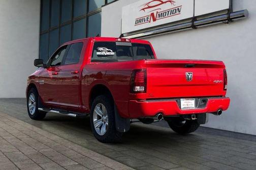 Red 2015 RAM 1500 Sport