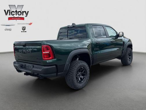Serrano Green Metallic 2026 RAM 1500 RHO Crew Cab 4x4 5'7' Box
