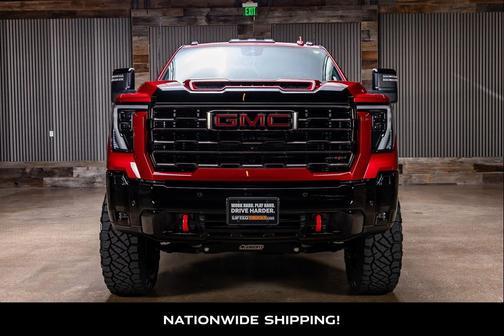 Volcanic Red Tintcoat 2025 GMC Sierra 2500 AT4X